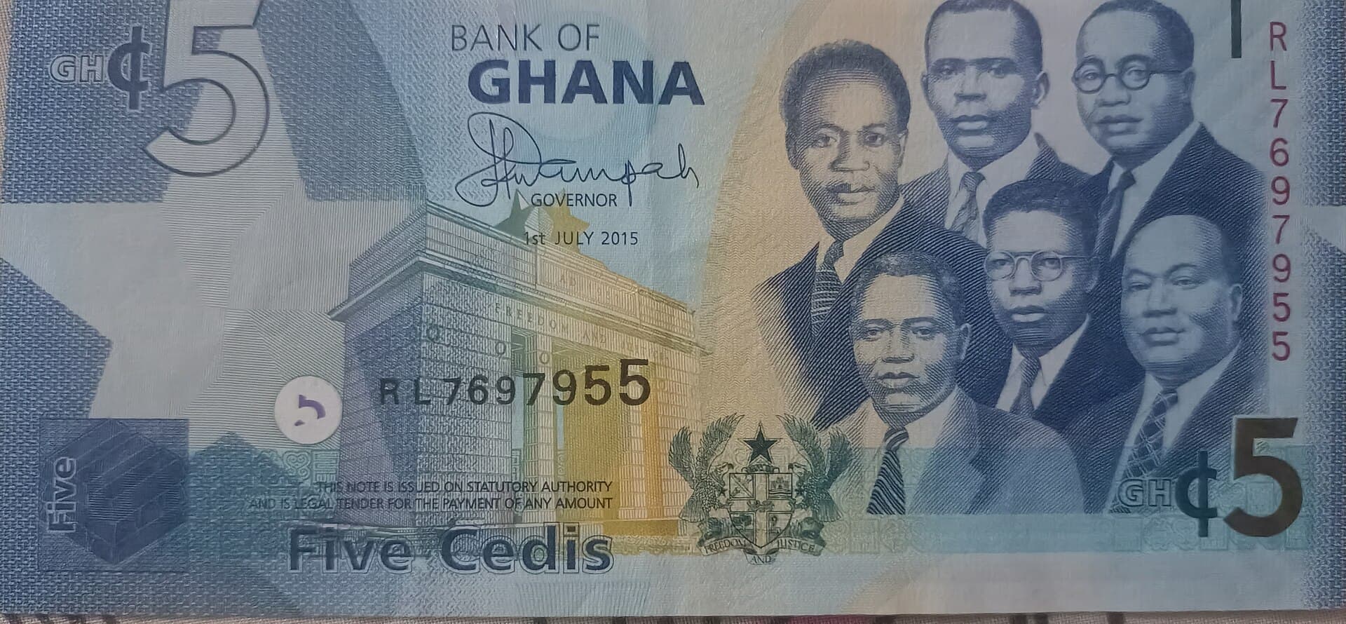 Front of a Ghanaian five cedi banknote with the Independence Arch and portraits of Ghana's founding leaders